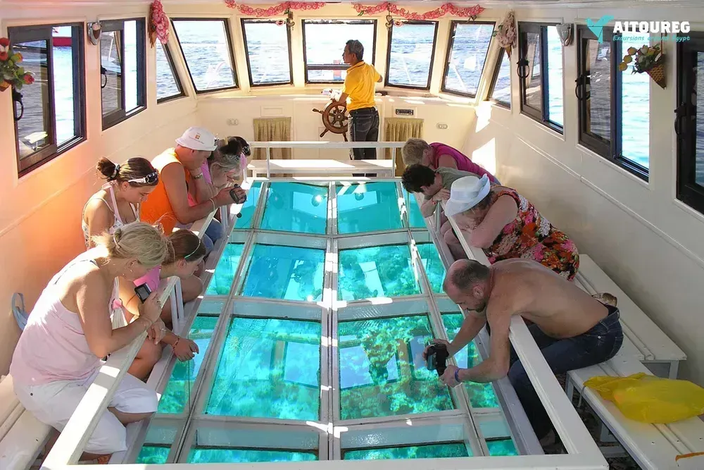 Glass bottom boat cruise and coral reef viewing